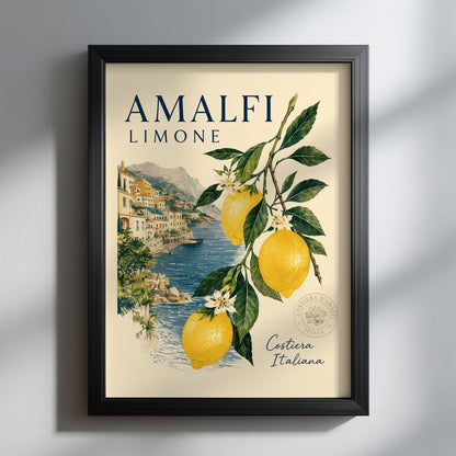 lack framed Amalfi Coast lemon print hanging on a clean light wall with soft shadow. The Italian travel poster shows bright yellow lemons, green leaves and a coastal village by the sea, giving a fresh Mediterranean summer look for modern kitchen or living room decor.