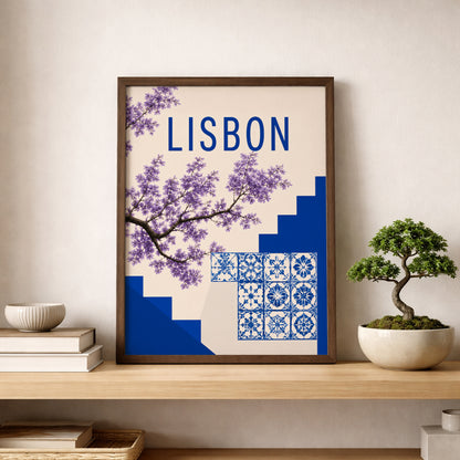 Lisbon poster displayed on a wooden shelf beside a small bonsai plant, with blue azulejo tiles, purple flowers, bold Lisbon text and deep blue steps. A simple Portugal print for shelf styling, hallway decor, bedroom wall art or travel inspired interiors with calm blue and cream tones.