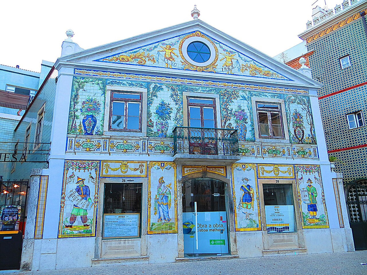 Polychrome figurative azulejos covering the full façade of the former Viúva Lamego ceramic factory at Largo do Intendente in Lisbon

Mister No, CC BY 3.0 <https://creativecommons.org/licenses/by/3.0>, via Wikimedia Commons

https://commons.wikimedia.org/wiki/File:Fabrica_Viuva_Lamego_-_panoramio.jpg