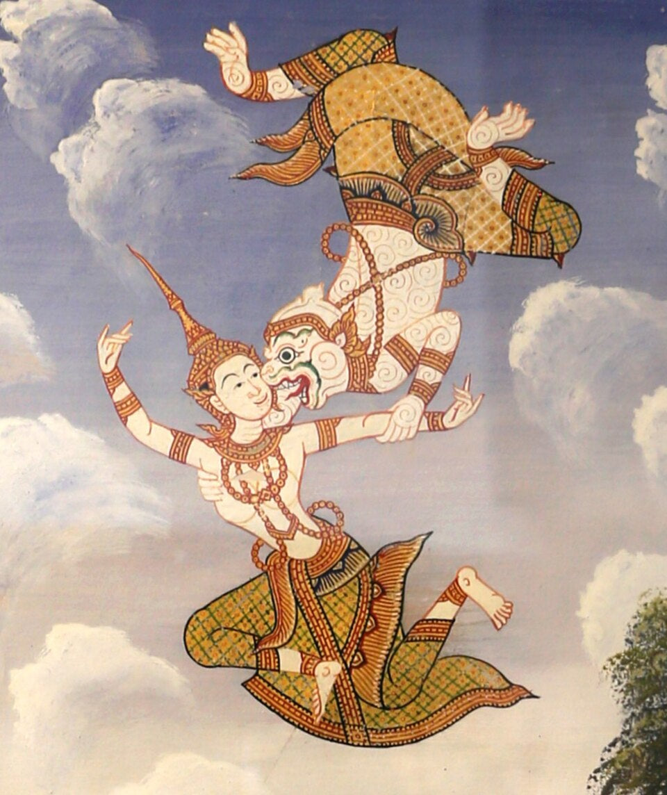 Traditional Thai Ramakien mural depicting Hanuman in ornate costume with another figure among clouds.

Sailko, CC BY 3.0 <https://creativecommons.org/licenses/by/3.0>, via Wikimedia Commons

https://commons.wikimedia.org/wiki/File:Benyakai_and_Hanuman,_Siam,_storie_del_ramakien,_xix_secolo,_hanuman_smaschera_benyagi_01.jpg