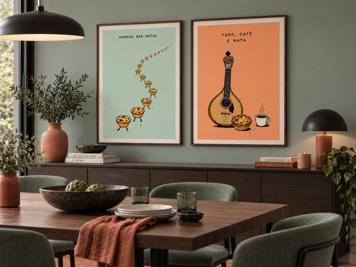 Two Portuguese wall art prints featuring pastéis de nata, fado and coffee framed in a contemporary sage and terracotta dining room.