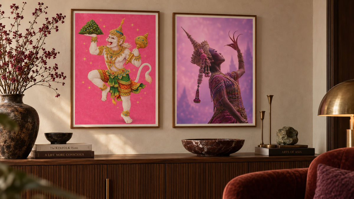 Thai Hanuman and traditional Thai dancer art prints framed above a walnut console in a contemporary interior.