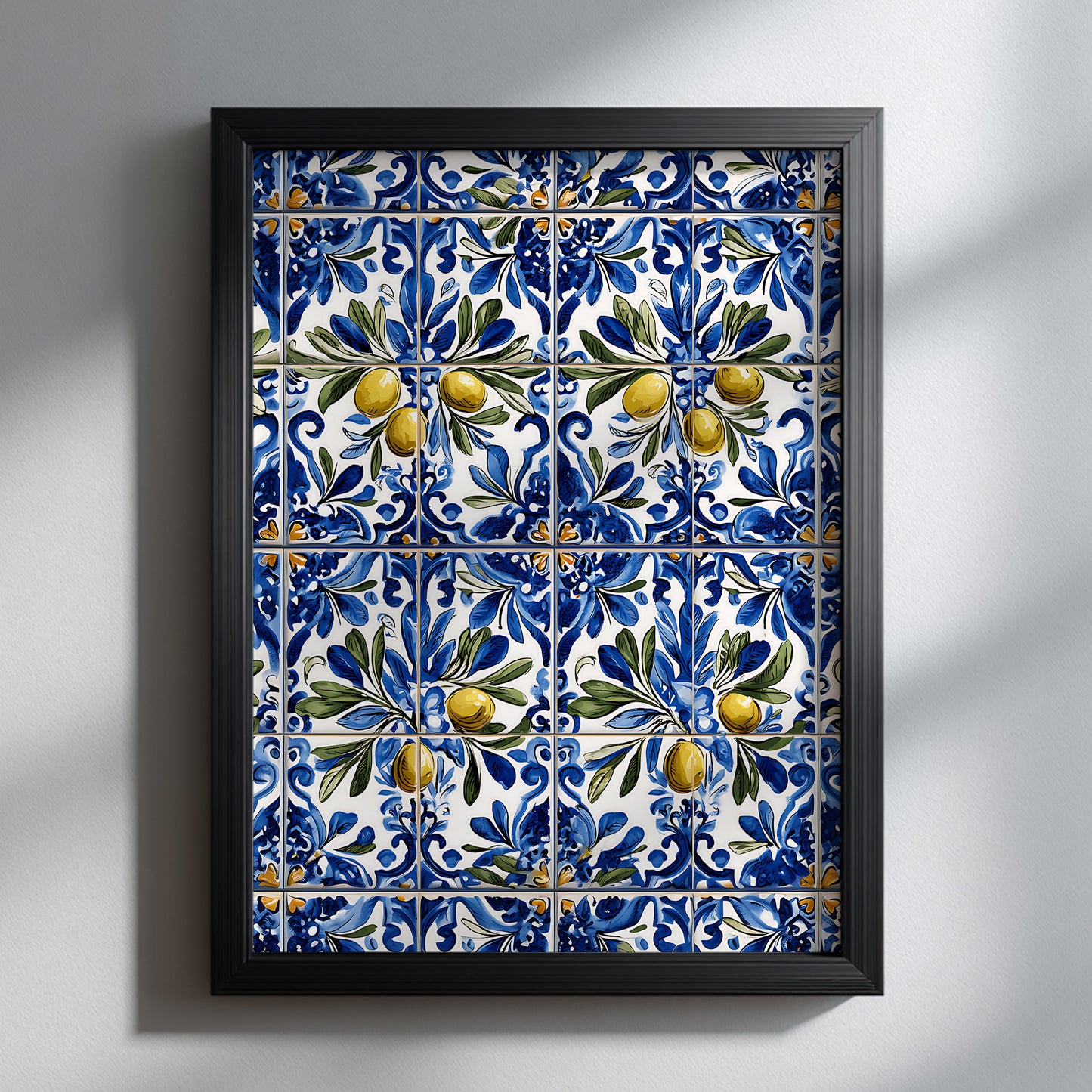 Portuguese blue azulejo olive print in a black frame on a light textured wall, showing golden olives, green leaves and detailed floral tilework.