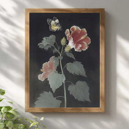Malaysian hibiscus and Rajah Brooke’s Birdwing butterfly wall art displayed in a light wooden frame on a white wall. The botanical print features red and pink hibiscus flowers with green leaves and a pale yellow butterfly above. Vintage botanical wall art with a clean, minimal presentation suitable for modern interiors.