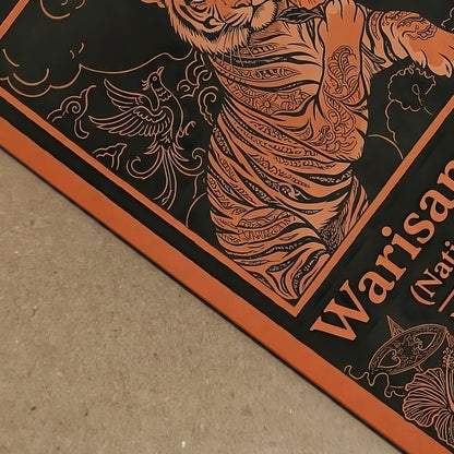 Close-up detail of the Warisan Bangsa National Heritage Malaysia poster showing the orange line illustration of a tiger, hibiscus flower and decorative floral patterns printed on textured paper. The vintage inspired Malaysian culture artwork uses strong graphic lines and ornamental borders against a dark background, highlighting traditional decorative illustration and national symbolism.