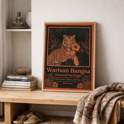 Malaysian heritage wall art Warisan Bangsa National Heritage framed and displayed on a wooden shelf with books and textiles. The artwork depicts a calm tiger holding a hibiscus flower with decorative birds and floral ornaments forming a detailed border. Orange illustration lines on a dark background create a bold vintage Malaysia culture poster inspired by traditional design.