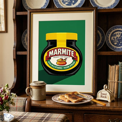 Framed Marmite Jar Print displayed above a dining setup with warm wood tones, food on the table and decorative shelving around it. The bold green background, black jar and yellow lid stand out clearly, giving the room a playful pop art focal point. A strong example of British food wall art used in a dining room, breakfast nook or home bar with modern and character-led styling.