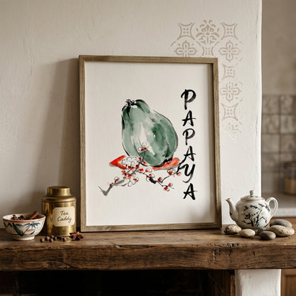Papaya wall art styled above a mantel in a warm interior with pottery, books, and natural decor. The framed print shows a green papaya, fine black brush lines, red and white blossom details, and vertical PAPAYA lettering. This room mockup shows how the tropical fruit print works as kitchen wall decor, dining room art, or minimalist botanical artwork in a calm home setting.
