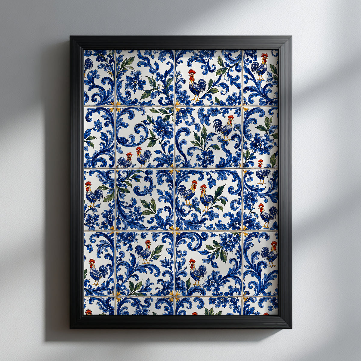 Portuguese rooster azulejo print in a black portrait frame, featuring blue and white decorative tile patterns, floral scrollwork and colourful rooster motifs on a light grey wall.