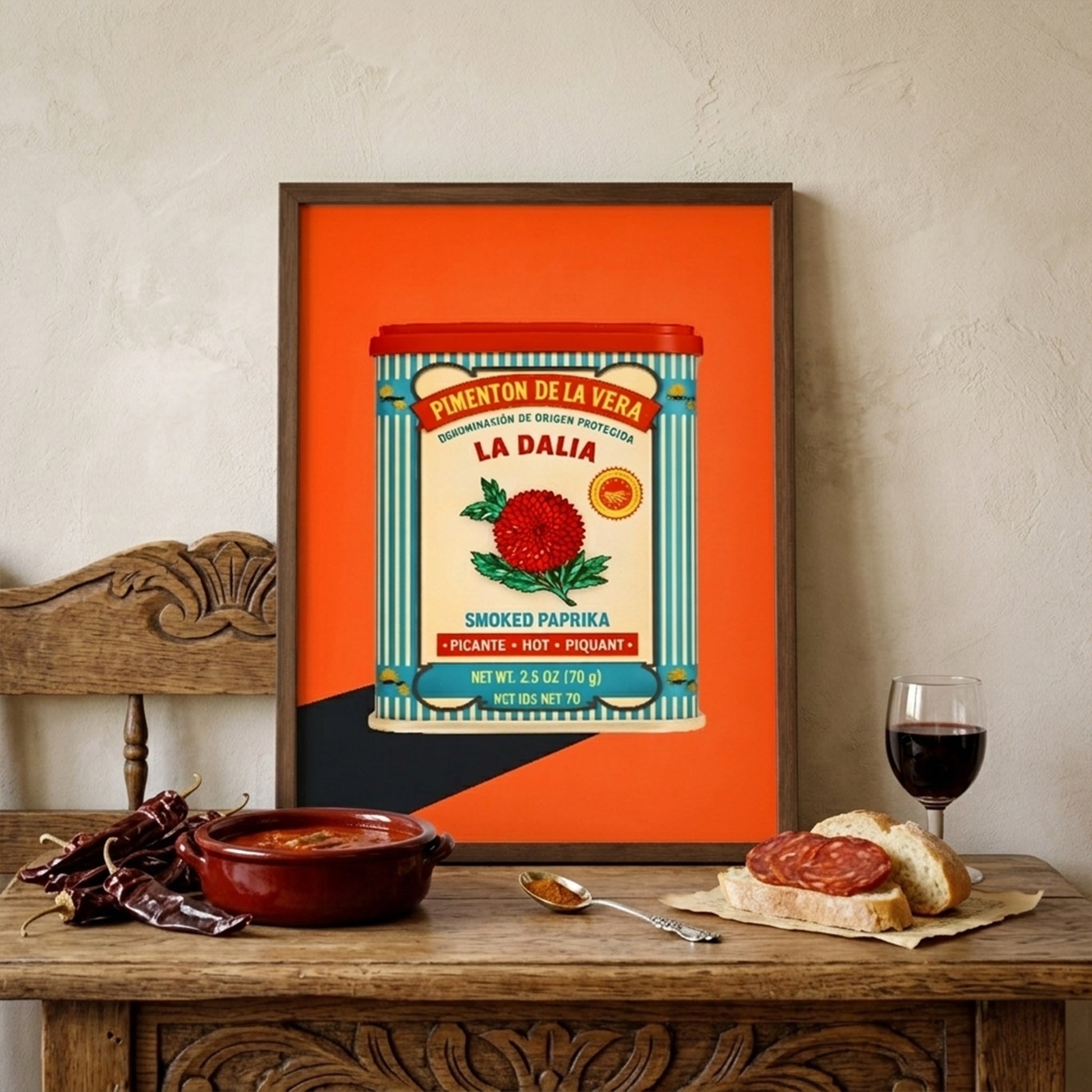 Interior styling photo of the Spanish Smoked Paprika Tin print displayed on a mantle with decorative home accessories around it. The framed artwork brings a bright orange focal point to the room, with the vintage spice tin design clearly visible. A useful image for Mediterranean kitchen decor, retro food wall art, Spanish pantry inspired decor and framed wall art for colourful homes.