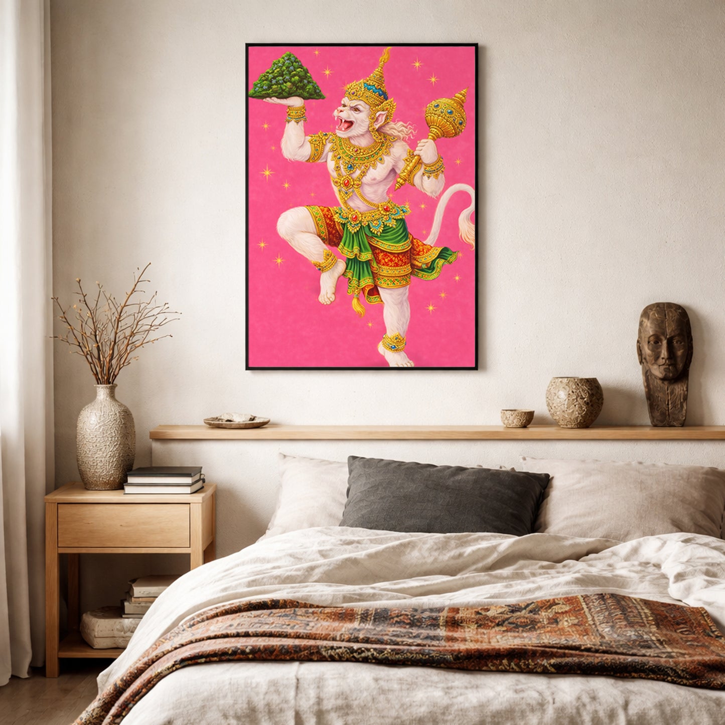 Thai Hanuman Ramakien art print mounted on a neutral bedroom wall above a bed with soft textiles. The bright pink background and ornate depiction of the Hindu monkey god create a vibrant focal point. A spiritual mythology poster that blends traditional Thai Ramakien artistry with modern bedroom interior styling.