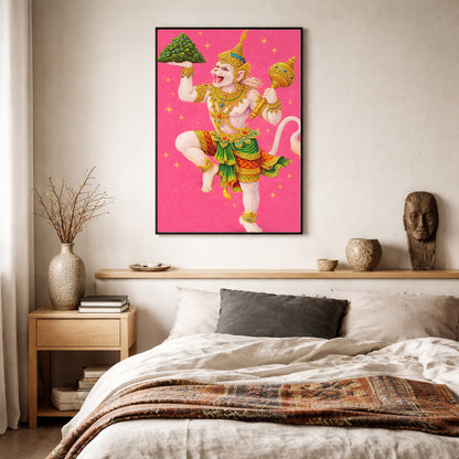 Thai Hanuman Ramakien art print mounted on a neutral bedroom wall above a bed with soft textiles. The bright pink background and ornate depiction of the Hindu monkey god create a vibrant focal point. A spiritual mythology poster that blends traditional Thai Ramakien artistry with modern bedroom interior styling.