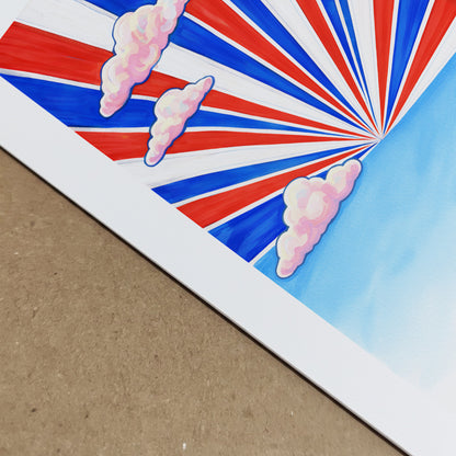 Close-up detail of the Thai Sky Sunburst poster print showing crisp red, white and blue rays and soft pink clouds against a clear blue sky. The image highlights paper texture and print quality of the Thailand travel art. Bold Southeast Asia wall decor with sharp graphic finish.
