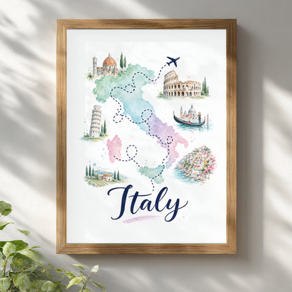 Italy watercolour map poster displayed in a light wooden frame on a clean white wall, with soft window shadows and blurred green leaves in the foreground. The artwork combines pastel map colours, dotted travel routes, a small aeroplane, Italian landmarks and bold Italy lettering for bright Mediterranean-inspired wall decor.