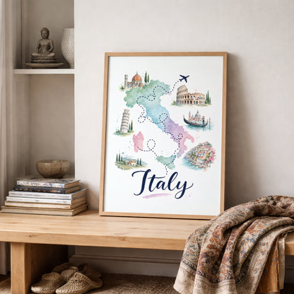 Wood-framed Italy map print styled on a shelf in a warm neutral interior with stacked books, natural textures and a folded patterned throw. The pastel artwork shows Italy in soft green, pink, blue and purple, surrounded by illustrated landmarks, dotted routes and a small aeroplane for relaxed Mediterranean travel decor.